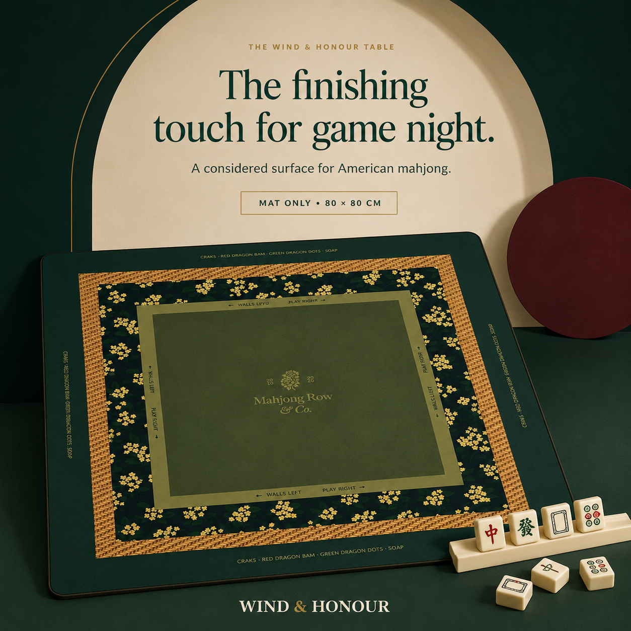 Green Mahjong table mat shown with tiles against a bottle-green background